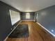 Spacious living room with hardwood floors, abundant natural light, and a neutral color palette at 2273 Childress Dr, Atlanta, GA 30311