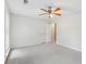 Bedroom featuring neutral colored walls and plush gray carpet with a ceiling fan at 2895 Shurburne Dr, Alpharetta, GA 30022
