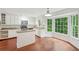 Bright kitchen featuring white cabinets, granite countertops, stainless appliances, and bay window at 2895 Shurburne Dr, Alpharetta, GA 30022