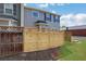 Cozy backyard featuring a wood fence and a view of the home's exterior at 3552 Clear Creek Nw Xing, Kennesaw, GA 30144