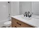 Bright bathroom featuring a tub and shower combo, updated fixtures, and a vanity at 3552 Clear Creek Nw Xing, Kennesaw, GA 30144