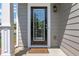 Inviting front door with glass window and stylish exterior lighting at 3552 Clear Creek Nw Xing, Kennesaw, GA 30144