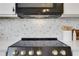 Stylish kitchen range and backsplash, adding a touch of elegance to the cooking space at 3552 Clear Creek Nw Xing, Kennesaw, GA 30144