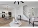 Spacious open-concept living area with an adjoining kitchen and white color scheme at 3552 Clear Creek Nw Xing, Kennesaw, GA 30144
