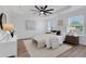 Bright bedroom showcasing a tray ceiling, stylish furniture and plenty of natural light at 3552 Clear Creek Nw Xing, Kennesaw, GA 30144