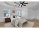 Bright bedroom showcasing a tray ceiling, stylish furniture and plenty of natural light at 3552 Clear Creek Nw Xing, Kennesaw, GA 30144