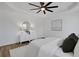 Spacious bedroom featuring a tray ceiling, wood flooring, and stylish decor at 3552 Clear Creek Nw Xing, Kennesaw, GA 30144