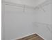 Empty walk-in closet with white shelving and plenty of storage space at 3552 Clear Creek Nw Xing, Kennesaw, GA 30144