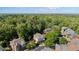 Desirable neighborhood aerial view highlighting the lush tree coverage and winding streets at 4675 Lakeway Pl, Alpharetta, GA 30005