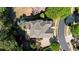 Stunning aerial view of a well-maintained home with lush landscaping and private backyard at 4675 Lakeway Pl, Alpharetta, GA 30005