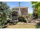 Beautiful brick home featuring a spacious back yard, wooden deck, and staircase at 4675 Lakeway Pl, Alpharetta, GA 30005