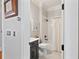 This bathroom features a shower and tub, along with a nice black vanity at 4675 Lakeway Pl, Alpharetta, GA 30005