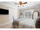 Bedroom with neutral walls, carpet, ceiling fan, and large window at 4675 Lakeway Pl, Alpharetta, GA 30005