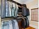 Spacious closet with custom shelves and a window at 4675 Lakeway Pl, Alpharetta, GA 30005
