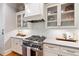 Beautiful kitchen with designer backsplash, stainless steel appliances, and custom cabinetry at 4675 Lakeway Pl, Alpharetta, GA 30005