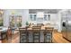 Bright kitchen boasts stainless steel appliances, an island with seating, and hardwood floors at 4675 Lakeway Pl, Alpharetta, GA 30005