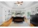 Spacious main bedroom features a decorative ceiling, many windows and hardwood floors at 4675 Lakeway Pl, Alpharetta, GA 30005