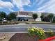 Attractive Topgolf exterior featuring a modern facade, well-maintained landscaping, and ample parking at 107 Iveybrooke Ln # 58, Alpharetta, GA 30009