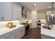 Modern kitchen featuring stainless steel appliances, subway tile backsplash and white quartz countertops at 107 Iveybrooke Ln # 58, Alpharetta, GA 30009
