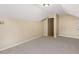 Finished attic featuring neutral walls and carpeting at 124 Williams Blf, Mcdonough, GA 30252