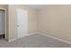 Neutral bedroom featuring a closet and carpet floors at 124 Williams Blf, Mcdonough, GA 30252