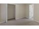 Bedroom with attached bathroom, a closet and carpet floors at 124 Williams Blf, Mcdonough, GA 30252
