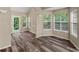 Bright dining area filled with natural light and modern flooring at 124 Williams Blf, Mcdonough, GA 30252
