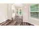 Sunny dining area with updated flooring, and ample windows for great views at 124 Williams Blf, Mcdonough, GA 30252