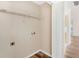 Laundry room with storage shelf and tile flooring at 124 Williams Blf, Mcdonough, GA 30252
