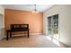 Dining room features hardwood floors, an accent wall, and sliding doors to a deck at 2419 Ivey Crest Cir, Tucker, GA 30084