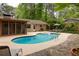 Aerial view of a home with a pool and backyard at 4228 Durham Cir, Stone Mountain, GA 30083