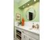Bathroom featuring white tile, quartz countertops, and stylish decor at 4228 Durham Cir, Stone Mountain, GA 30083