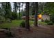 Beautiful home surrounded by mature trees and landscaping at 4228 Durham Cir, Stone Mountain, GA 30083