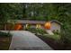 Charming single-story home with stone accents, well-maintained landscaping, and a concrete driveway at 4228 Durham Cir, Stone Mountain, GA 30083