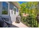 Outdoor deck with grill and views of natural green landscape at 5635 Cherokee Trce, Cumming, GA 30041