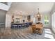 Large, updated kitchen features a center island, stainless steel appliances, and an adjacent dining area at 5635 Cherokee Trce, Cumming, GA 30041