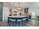 This large kitchen island has seating, storage and plenty of space for food prep and entertaining at 5635 Cherokee Trce, Cumming, GA 30041