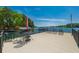 Enjoy outdoor living on this spacious lake view deck, perfect for entertaining and relaxing in a serene setting at 5635 Cherokee Trce, Cumming, GA 30041