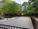 Community basketball court with hoop and tennis court nearby, offering recreational activities at 1016 Lenox Ne Crst, Atlanta, GA 30324