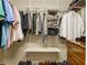 Walk-in closet with shelving, hanging rods, and built-in storage at 1016 Lenox Ne Crst, Atlanta, GA 30324