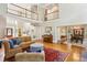 Open-concept layout with living room flowing into the dining area, showcasing hardwood floors at 1016 Lenox Ne Crst, Atlanta, GA 30324