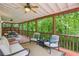 Spacious screened-in porch with comfortable seating perfect for outdoor relaxation and entertaining at 1016 Lenox Ne Crst, Atlanta, GA 30324