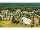 Aerial view of planned community amenities includes pool, clubhouse, playground, and tennis courts at 40 Templeton Ln, Villa Rica, GA 30180