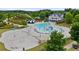 Aerial view of the community pool and waterpark including several water slides and sunbathing areas at 40 Templeton Ln, Villa Rica, GA 30180