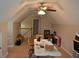 Spacious bonus room with vaulted ceilings and ceiling fan, perfect for a home office or additional living space at 40 Templeton Ln, Villa Rica, GA 30180