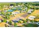 Aerial view of community sports courts including tennis, basketball, volleyball, and garden at 40 Templeton Ln, Villa Rica, GA 30180