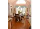 Bright and airy dining area with vaulted ceilings, hardwood floors, and charming decor at 40 Templeton Ln, Villa Rica, GA 30180