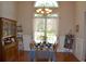Elegant dining room with a chandelier, large window, and traditional furniture at 40 Templeton Ln, Villa Rica, GA 30180