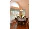 Bright dining area with vaulted ceilings, hardwood floors, and a charming window at 40 Templeton Ln, Villa Rica, GA 30180