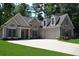 Charming home featuring a stone and siding exterior, well maintained lawn, and two car garage at 40 Templeton Ln, Villa Rica, GA 30180